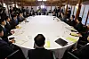 Prime Minister Kim Min-seok, center right, speaks during a high-level party-government consultation at the prime minister’s residence in Samcheong-dong, central Seoul, on July 6. This is the first such meeting since the inauguration of the Lee Jae Myung administration. [YONHAP]