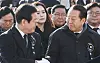 Kwon Young-se, right, chief of the ruling People Power Party's emergency leadership committee, speaks with Lee Jae-myung, leader of the main opposition Democratic Party, during a memorial service for late former National Assembly Speaker Kim Soo-han at the parliamentary building in Seoul on Jan. 3. [NEWS1]