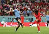 Son Heung-min, right, shoots during a Group H match against Uruguay at the 2022 Qatar World Cup at Education City Stadium in Doha, Qatar on Nov. 24, 2022. [YONHAP/JOONGANGILBO]