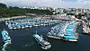 Fishing boats anchor at Seogwipo Port on Jeju Island Monday in advance of Typhoon Bavi approaching the Korean Peninsula. The powerful typhoon, accompanied by strong winds and heavy rains, will directly affect the Korean Peninsula on Wednesday and Thursday. [YONHAP]