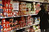 A customer looks at the ramyeon aisle in a retail market in Seoul on Sunday. Ramyeon exports hit a record $568.2 million from January to September this year, 18 percent more than the same period last year, thanks to the spread of Hallyu, or the Korean wave, around the world, according to the Korea Agro-Fisheries & Food Trade Corporation and the Korea Agricultural Trade Information (KATI). [YONHAP]