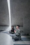 Visitors mediate under natural light at the Meditation Hall of the Museum SAN. [MUSEUM SAN]