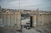 An Israeli officer directing traffic at the Qalandia checkpoint between Ramallah, in the Israelioccupied West Bank, and Jerusalem on Dec. 3, 2023. Spain, Norway and Ireland said on May 22, 2024 that they would recognize an independent Palestinian state, a rebuke to Israel over its war in Gaza and its decades of occupation of Palestinian territories. [Sergey Ponomarev/The New York Times]