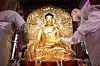 Monks clean a statue of Buddha in the main hall of Jogye Temple in Jongno District, central Seoul, on Tuesday, a week ahead of Buddha’s Birthday on May 19 this year. [NEWS1]