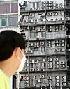 Air-conditioning units, on an outer wall of a high-rising building in Seoul, spew hot air on Monday as daytime temperature reached 35 degrees Celsius (95 Fahrenheit) in Seoul. [NEWS1]