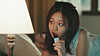 BIBI is eating bamyanggaeng, otherwise known as chestnut jelly stick, in the music video of her song 'Bam Yang Gang' released in February. [SCREEN CAPTURE]