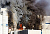 Black smoke rises from battery maker EcoPro BM's plant in Cheongju, North Chungcheong, on Friday. [YONHAP]