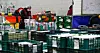 Market Kurly employees with masks sort parcels at the company’s logistics center in Songpa District, southern Seoul. [NEWS1]
