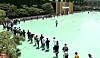 Applicants for jobs at Korea Railroad (Korail) queue up to enter a building on a college campus in Seongbuk District, central Seoul, Sunday afternoon, while practicing social distancing. Some 43,000 people applied to take the written exam, which was held in 24 test sites across the nation. [NEWS1]