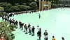 Applicants for jobs at Korea Railroad (Korail) queue up to enter a building on a college campus in Seongbuk District, central Seoul, Sunday afternoon, while practicing social distancing. Some 43,000 people applied to take the written exam, which was held in 24 test sites across the nation. [NEWS1]