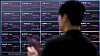 The prices of cryptocurrencies are displayed on an electronic board at Bithumb office in southern Seoul on Thursday. [YONHAP]