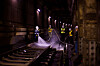 Seoul Metro employees clean a tunnel near City Hall Station along subway line No. 1 in downtown Seoul on April 1, 2023. [SEOUL METRO]