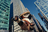Parade balloons are guided along the route during the Macy’s Thanksgiving Day Parade in New York, Thursday, Nov. 23, 2023. In the days leading up to the parade, organizers test the giant balloons to help ensure safety. [Amir Hamja/The New York Times]