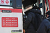 Passengers board a bus near Seoul Station on Monday as public service costs rise, despite the government's attempt to freeze such fees.[YONHAP]