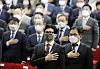 Justice Minister Han Dong-hoon pledges allegiance to the flag at the Government Complex in Gwacheon, Gyeonggi during his appointment ceremony on Tuesday. [YONHAP]