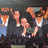 Suga of BTS is projected on the screen during the Unpacked event on Wednesday at Coex. [YONHAP]