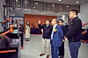 Hanwha Group Chairman Kim Seung-youn, center, inspects robots at Hanwha Robotics' headquarters in Seongnam, Gyeonggi, on Friday. [HANWHA]