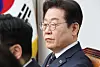 Democratic Party leader Lee Jae-myung attends a party leadership meating at the National Assembly building in Yeouido, western Seoul, on March 12. [YONHAP]