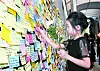 A child places a commemorative message at the memorial space in Seo2 Elementary School in southern Seoul on Sept. 4 following a death of a distressed young teacher due to parents' gapjil. [YONHAP]