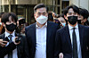 Yoo Dong-kyu, former acting president of Seongnam Development Corporation, leaves the Seoul Central District Court in Seocho District, southern Seoul, Monday after a hearing on the Daejang-dong land development project. [NEWS1]