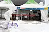 A health official clears snow at a Covid-19 testing site in Gwangju Wednesday morning as the city saw some 14 centimeters (5.5 inches) of snow. [NEWS1]