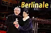 Director Hong Sang-soo and actor Kim Min-hee pose with the Silver Bear Grand Jury Prize for 'The Novelist's Film' after the award ceremony of the 72nd Berlin International Film Festival in Berlin, Germany, February 16, 2022. [REUTERS/YONHAP]