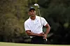 Tiger Woods plays a shot on the 18th hole during a practice round prior to the Masters at Augusta National Golf Club on Wedensday in Augusta, Georgia. [AFP/YONHAP]