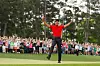 In this file photo taken on April 14, 2019, Tiger Woods celebrates after sinking his putt on the 18th green to win during the final round of the Masters at Augusta National Golf Club in Augusta, Georgia. [AFP/YONHAP]