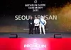 Chef Kang Min-goo, middle, poses with Managing Director of Michelin Korea Jerome Vincon, after his restaurant Mingles in Seoul was awarded three stars for the first time, on Thursday, at The Westin Josun Seoul in Jung District, central Seoul. [MICHELIN GUIDE]
