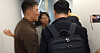 Apple Korea officials including a senior manager, left, block the entry of FTC agents to their office in 2017. The FTC referred the case to the prosecution, a first for the regulator for this sort of infraction. [FAIR TRADE COMMISSION]
