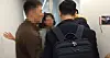 Apple Korea officials including a senior manager, left, block the entry of FTC agents to their office in 2017. The FTC referred the case to the prosecution, a first for the regulator for this sort of infraction. [FAIR TRADE COMMISSION]