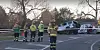 First responders stand in front of the crash site on New Zealand's South Island. [SCREEN CAPTURE / THE NEW ZEALAND HERALD]