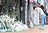 A woman prays for the young man, who lost his life after being attacked randomly by 33 year-old Cho Sun in Silim-dong last month. An assault and rape case occured at a park in the same neighborhood despite increased police presence. [YONHAP]