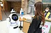 Woody takes a student's temperatures and checks if she is wearing her mask properly. Seocho District, southern Seoul, is planning to install infrared cameras and robots with built-in facial recognition functions at 51 schools by the end of July. [SEOCHO DISTRICT OFFICE]