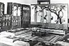 A photograph in the gift catalogue displays the various pieces of furniture presented to Stalin by Kim Il Sung arranged in a sitting room. [KIM HYUN-DONG]