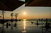Hotel guests at the Grand Hyatt Jeju enjoy time at the pool. [LOTTE TOUR]