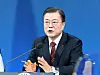 President Moon Jae-in speaks during a hybrid in-person and virtual New Year's press conference Monday at the Blue House in central Seoul. Moon answered questions from journalists about a range of issues, including widening economic inequality, special pardons and the profit-sharing plan for corporations. [JOINT PRESS CORPS]
