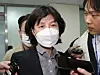 Yang Jung-suk, a lawmaker-elect of the Citizen Party, leaves the party headquarters building on April 28 after the party's ethics tribunal meeting to expel her. YONHAP