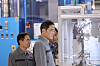 Samsung Electronics Executive Chairman Lee Jae-yong, right, inspects a multilayer ceramic capacitor production plant in Tianjin, China, Friday. [SAMSUNG ELECTRONICS]