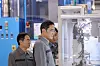 Samsung Electronics Executive Chairman Lee Jae-yong, right, inspects a multilayer ceramic capacitor production plant in Tianjin, China, Friday. [SAMSUNG ELECTRONICS]