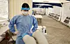A medical worker stands at a temporary screening test center in Gwangjin District, eastern Seoul, on Wednesday, a day ahead of the permanent closing of the test center as the country downgrades its national risk level for Covid-19 from ″serious″ to ″alert″ starting Thursday. [YONAHP]