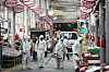 Workers in full protective gear disinfect a traditional outdoor market in Gwangju on Wednesday as Chuseok, or the Korean harvest holiday, approaches. [YONHAP]