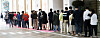 People lining up in front of a luxury brand store at a department store in Jung District, central Seoul, on Tuesday. According to the Bank of Korea, consumer confidence for this month has risen to its highest level in nearly three years thanks to growing expectations of an economic recovery. Several indicators, including robust exports, have contributed to the improvement in consumer sentiment. [NEWS1]