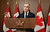 Canada's Prime Minister Mark Carney speaks at a news conference about the US tariffs on Parliament Hill in Ottawa on April 3.