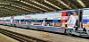 A KTX train covered with photos of BTS member Jungkook stands at Seoul Station in central Seoul on Tuesday. According to Korea Railroad (Korail), Jungkook's Chinese fans requested the advertisement wrap around the outside of the nearly 400-meter-long (1,300-foot-long) train, covered with images of Jungkook and wishing him a happy birthday. [NEWS1]