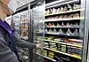 A door was installed on the open-refrigerated section of a convenience store in eastern Seoul on Tuesday. The store said it saved up to 63 percent in daily electricity fees compared to the same period a year earlier after installing the door last month. The government announced an increase in electricity rates for consumer and industrial use by 8 won ($0.01) per kilowatt hour for the second quarter on Monday.