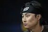 San Diego Padres' Kim Ha-seong looks on during a baseball workout at Gocheok Sky Dome in western Seoul on Saturday. [AP/YONHAP]