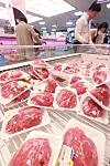 Customers shop for meat at a supermarket in Seoul on Sunday amid reports of lumpy skin disease, an infectious disease in cattle, in Korea. [YONHAP]