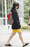 BTS member V walks out of the Seoul Gimpo Business Aviation Center on Tuesday and goes straight to his van without greeting his fans or the local press. [NEWS1]