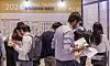 Visitors look at jobs available for international students at the 2024 Global Talent Fair held in Coex in Gangnam District, southern Seoul, on Tuesday. [YONHAP]